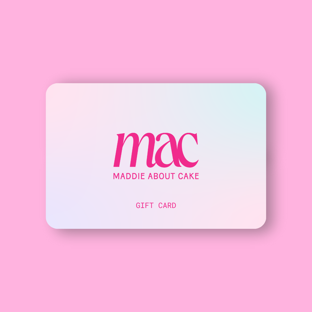 Graphic of the Maddie About Cake gift card. Gift card features a soft gradient background of pinks, blues, and purples, with a hot pink Maddie About Cake logo in the center. Gift card is placed on a medium pink background.